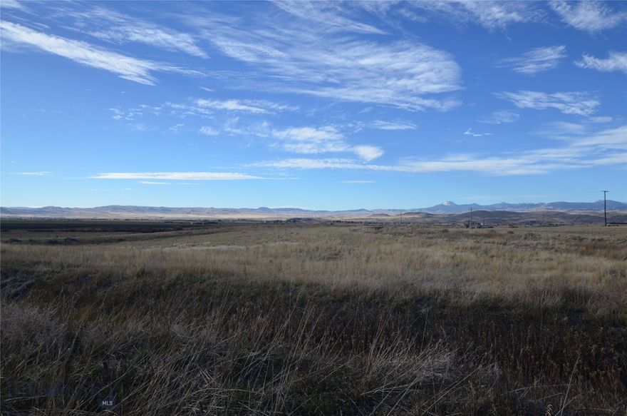 Get away from it all and enjoy country living on 5.664 acres. Breathtaking views of the Blacktail, Sweetwater and the Pioneer Mountain Ranges.   Build your dream home on this nice sized lot and borders East Bench Canal.Located around 3 miles south of Dillon mostly paved road. Fresh clean air and gorgeous star-filled night skies for you to enjoy. Year round access on a maintained and snowplowed county road. Power is available through Viglante Electric and  Sewer would be a septic system.  Buyer is responsible for drilling their own well.  Enjoy all of the small-town amenities and close to big game hunting and blue ribbon fishing.