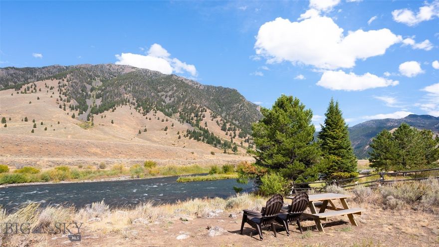 Rare Madison Riverfront Lot — Build-Ready and Waiting for You! Opportunities like this don’t come often — a build-ready lot on the legendary Madison River, offering privacy, quiet, and unmatched recreational access. Located in a small, private neighborhood with well-maintained roads and year-round access, this property is ready for your dream home or investment project. The well and septic are approved, with power and fiber optics already to the lot. Unlike many stretches of the Madison, this is a wade-only section — meaning no boats floating by, just the peaceful sounds of the river and the beauty of nature all around you. Short-term rentals are allowed, giving you flexibility whether you plan to enjoy the property yourself or generate income. Wildlife is abundant, and endless outdoor activities are nearby, from hiking trails and alpine lakes to world-class hunting and fishing. 
There’s no active HOA with mandatory dues; property owners simply contribute as needed for road maintenance and snow plowing. This is one of the very few undeveloped lots remaining along this coveted section of the Madison River. Don’t miss your chance to own a piece of Montana paradise!