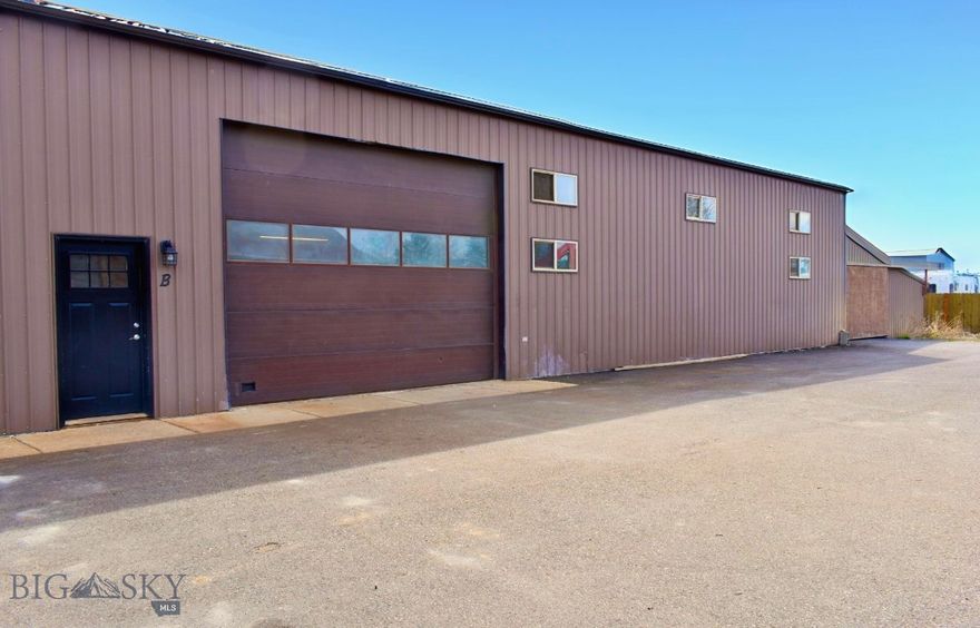 Versatile industrial space with ample parking, 12' high overhead door, restroom and private office. Updates include extensive 3-phase power upgrades, air compressor plumbing throughout with multiple hookup points, and completely remodeled office. Plenty of room for high amp equipment with multiple 220V outlets in the shop and 240A 3 phase power to unit. 

Property is also listed as MLS #399322 with the approx. 1,500 sqft enclosed "cold storage" area included. This listing is just for the warehouse/shop space and does not include the cold storage.