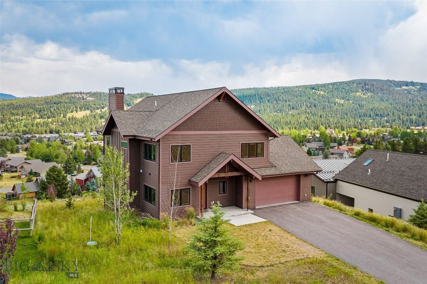 Perched above Big Sky’s vibrant Town Center, this beautifully appointed home in Meadow Village offers stunning panoramic views of the Gallatin Mountain Range. The location is exceptionally convenient, providing easy access to shops, restaurants, and year-round recreation.

With approximately 3,246 sq ft of living space, this fully furnished home features 4 bedrooms, 3.5 bathrooms, a dedicated office, two separate living areas, and a beautiful kitchen with attached dining area.—perfect for friends and family gatherings. Whether you're looking for a full-time residence or a mountain retreat, this property combines comfort, convenience, and breathtaking scenery.