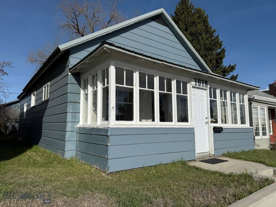 Step into cozy comfort with this updated single-family home.  The inviting living room showcases elegant hardwood floors that create a warm ambiance.  Enjoy the enclosed porch and a dedicated laundry area.  Plus, the property is on Harrison Avenue with commercial zoning offers the flexibility for use as an office or retail space.