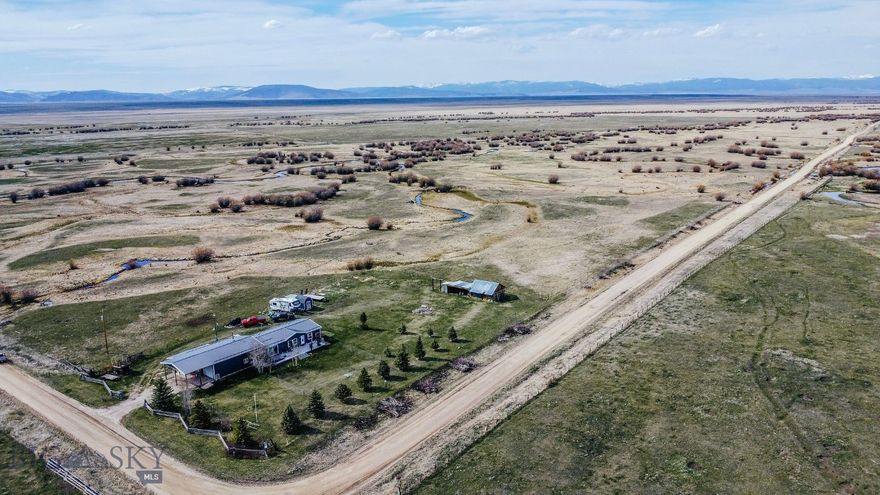 Set in Montana’s Big Hole Valley just outside Wisdom, 2000 Rock Creek Road offers a rare chance to own a true Montana getaway on 1.68± acres, walking distance from the Big Hole River and Big Lake Creek. Surrounded by sweeping views, big skies, and abundant wildlife—including elk, moose, and deer—this property captures the quiet, scenic lifestyle in which Montana is known.
Step inside through a spacious mudroom and into a single level 3 bed/2 bath home. New appliances and numerous updates, including a major remodel, bring modern convenience while maintaining the home’s warm, rustic character. Primary bedroom features a sliding glass door that walks out to a large deck for an early morning soak in the hot tub (with views!)
A heated garage provides plenty of room for gear, toys, or projects, and the hot tub offers the perfect place to unwind beneath Montana’s star-filled skies.
The Big Hole Valley is a true recreation hub, offering world-class fly fishing on the Big Hole River, exceptional big game hunting, skiing, and access to thousands of acres of public land. Hiking, horseback riding, and ATV trails are all within easy reach.
Whether you’re looking for quiet living, private retreat, or an investment opportunity, this property checks the boxes. With its location in a highly sought-after recreational area, it presents strong potential as a short-term rental or VRBO as well, while still serving as your own year-round escape for family and friends.
