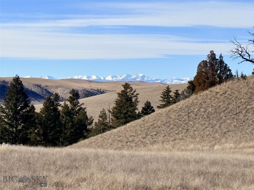 Dreaming of wide open Montana land where you can build, breathe, and live on your own terms?  This is the kind of property people move to Montana for.

Welcome to a rare 19.341 acre offering in the Gallatin Valley - two expansive and rolling parcels.  If you’re searching for land with true character, usable terrain, and long term privacy, this one rises above the rest.

This is no ordinary tract.  The landscape rolls gently before unfolding into rugged hillsides and a dramatic ravine that adds depth, beauty, and natural separation. Multiple elevated build sites capture sweeping views and offer flexibility for a main residence, guest home, barn, or shop. It’s a canvas for those who want more than just a house — it’s a foundation for a Montana legacy.

For buyers seeking horse property, homesteading potential, or a sustainable lifestyle, this acreage delivers the space and freedom to make it happen. There’s room for barns, corrals, fenced pasture, and riding areas. The sun exposure and open ground lend themselves beautifully to gardens and greenhouses, while the privacy and acreage create ideal conditions for livestock, bees, and self-sufficient living. Whether you envision solar panels, a thoughtfully designed off-grid system, or simply a quieter, more intentional way of life, this land supports it.

Bordering a 6,700-acre ranch, your western boundary is protected open space — not future development. The result is privacy that feels lasting and views that feel endless. Look out toward the Tobacco Root Mountains and let Montana’s vast sky handle the rest. Juniper trees scatter across the landscape, and old wooden corrals lend an authentic nod to the region’s ranching roots.

What truly elevates this property is its rare balance of seclusion and access. Tucked into the hills for privacy yet easily reachable year-round, it offers convenience without sacrificing that “away from it all” feeling. Just minutes away, the Missouri River and expansive BLM land provide fishing, riding, hiking, hunting, and year-round recreation practically out your future front door.

Whether your vision includes a horse-ready ranchette, a sustainable homestead, a multi-generational family compound, or a refined off-grid retreat, this land is ready to meet it.

In a market where usable acreage with protected borders is increasingly scarce, this is more than property — it’s opportunity. Space. Privacy. Freedom. And Montana exactly as it was meant to be.