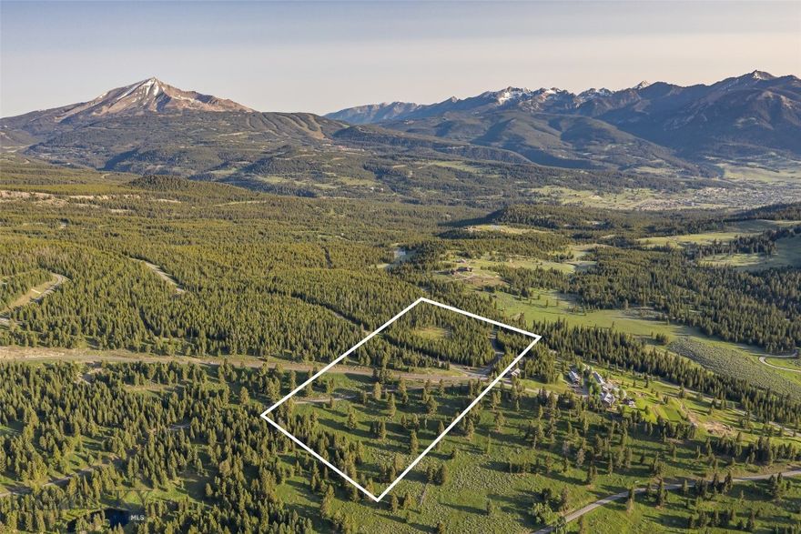 Discover the Pinnacle of Refined Mountain Living at Big EZ Estates – Lot 21
Nestled within the exclusive Big EZ Estates, Lot 21 offers an extraordinary 20-acre sanctuary, providing the ultimate blend of privacy, luxury, and natural beauty. This rare parcel is conveniently located just minutes from the heart of Big Sky Town Center, with paved road access and secure, gated entry, ensuring both privacy and convenience to neighboring private clubs Yellowstone Club and Spanish Peaks Mountain Club and minutes to the restaurants and shopping, farmers markets, concert series and rodeo in the Big Sky Town Center and 25 minutes to world class amenities of Big Sky Ski & Summer Resort.

Embrace awe-inspiring panoramic views of Lone Peak, Pioneer Mountain, and the iconic Spanish Peaks, where the landscape stretches in every direction to offer a visual masterpiece at every turn. Whether you’re imagining a serene private residence or an exceptional mountain retreat, this stunning lot serves as the perfect canvas for your Montana dream home.

At Big EZ Estates, exclusivity and tranquility come together in a community that celebrates both expansive natural landscapes and refined mountain living. With access to coveted amenities and a location that balances privacy with convenience, this property offers an unparalleled opportunity to craft your own legacy in one of the most sought-after areas of Big Sky.

Don’t miss the rare chance to own a piece of Big Sky’s most coveted and private enclave. Schedule your exclusive tour today and step into the epitome of mountain luxury living.