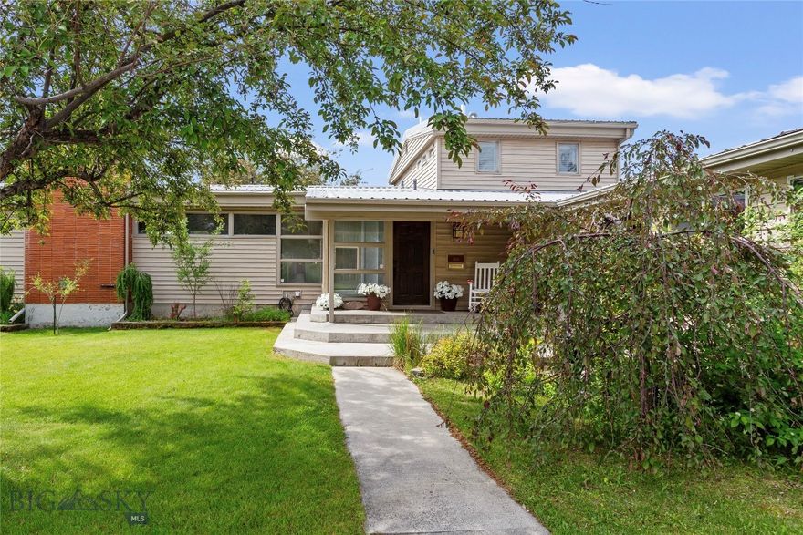 This 5-bed, 2.5-bath Mid-Century Modern home sits in the sought-after West School District just blocks from Montana Tech.  Positioned as the last house on the block, it enjoys extra privacy and very little through traffic. Features include vaulted beam ceilings, hardwood floors, and expansive windows offering serene views. The updated kitchen, dining, and expansive living area opens to a covered deck with a stubbed-in gas fire pit table—perfect for indoor-outdoor entertaining. A half bath is positioned near the main living and entertaining space for added convenience. The main-level primary suite includes deck access and a spa-like bath. A private den off the primary can serve as a sitting room, office, nursery, or separate rental space. The finished walkout basement offers 3 spacious bedrooms, a second custom tiled full bath, and laundry hookups on both levels. Enjoy a beautifully landscaped yard with underground sprinklers, garden area, and multiple outdoor living spaces. The heated 3-car garage includes a fitness room and workshop, plus 2 sheds—one with power, concrete slab, and shelving. New forced-air system, water heater, and A/C-ready setup. Enjoy sweeping mountain views, enhanced privacy, and versatile living--all in one move-in ready home!