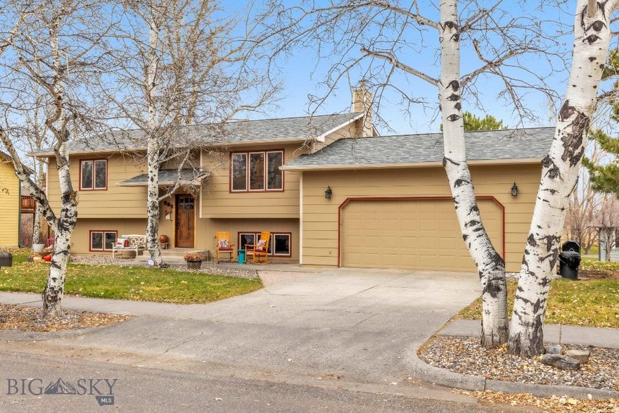 505 Westridge offers thoughtful updates, an incredible location and a backyard that opens directly to open space. The home has been immaculately maintained by the same owners since 1988 and was renovated in 2013, with a brand new roof just added. The upper level features a bright living area and an updated kitchen with soft-close cabinetry and an island that seats four. All kitchen appliances are new within the past 2 years. The full bathroom on this level includes granite counters, tile floors, and a whirlpool tub, along with a pocket door connecting to one of the upstairs bedrooms. Off the dining area is a sizeable Trex deck with a built-in kitchenette setup. Stairs from the deck lead down to the raised garden beds, a compost area, and direct access to the open space behind it. The lower level of the home includes two additional bedrooms, a second full bath, a comfortable family room, and a standout office/hobby space with extensive cabinetry, granite counters, and a butcher-block work area. A custom mudroom with additional storage for your outdoor or recreational gear and a pantry/root cellar style storage leads to the 24x24 garage. Laundry includes a utility sink and floor drain, and the home’s electric baseboard heat is supported by updated thermostats. This well-maintained home has quality updates and a versatile floor plan in a convenient location.