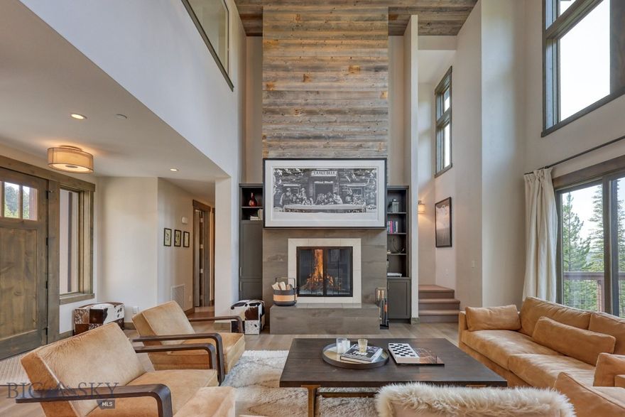Nestled in the Highlands neighborhood within the exclusive Spanish Peaks Mountain Club, this beautifully appointed 4-bedroom, 3.5-bathroom mountain retreat offers the perfect blend of luxury, comfort, and convenience.
Located at the top of the Highlands neighborhood, 102 Outlook receives especially good sun exposure and enjoys expansive views across the valley, overlooking the Spanish Peaks community and the Montage hotel. With no homes across the street, this home also benefits from more privacy than most others in the neighborhood.
Ski-in / ski-out access is directly across the street, and the soon-to-be-completed Aspire amenity building -- that will feature a state of the art fitness center, basketball court, climbing wall, outdoor pool and hot tubs -- is within easy walking distance.
The home has been thoughtfully designed and impeccably decorated, with considerable owner enhancements such as custom closets in the bedrooms and garage and sound proof glass around the loft TV room. The spacious open-concept living area features soaring ceilings, a cozy fireplace, and refined finishes, making it ideal for entertaining or relaxing after a day on the slopes.
Membership to Spanish Peaks Mountain Club allows you preferred access and discounts to Montage Big Sky, the Tom Weiskopf 18-hole golf course, the new 10-hole Par 3 golf course, elevated dining in the Spanish Peaks Clubhouse, and endless outdoor pursuits. Whether you're seeking a year-round residence or a seasonal getaway, this Highlands gem offers the perfect base for your Montana mountain lifestyle.
