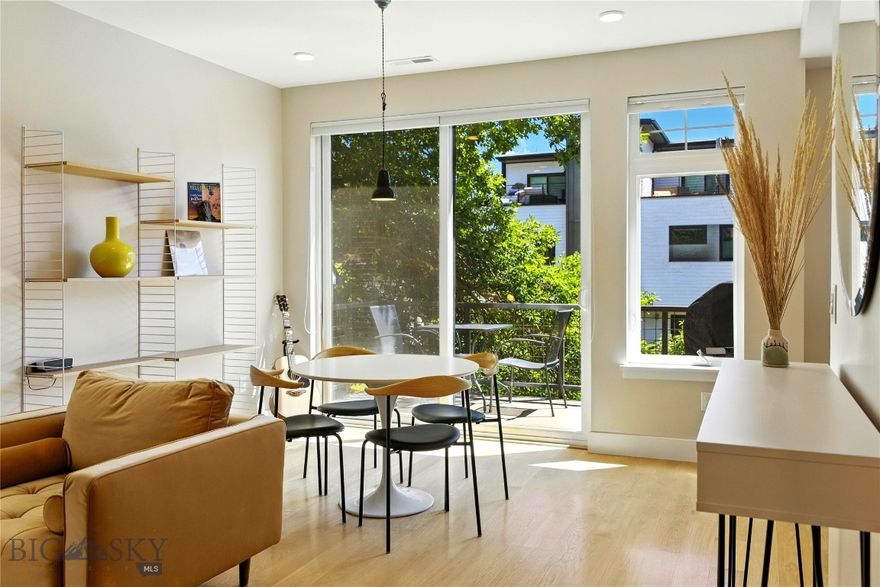 Located just one block from Main Street in the heart of downtown Bozeman, this charming 2-bedroom, 1-bath condo offers the perfect blend of convenience and comfort. Situated in a small building with only five units, this home features abundant natural light throughout and a warm, inviting atmosphere. Enjoy views of mature trees and the neighborhood from your windows and balcony, directly across from Hawthorne Elementary School. Whether you're walking to shops, restaurants, or the farmers market, this low-maintenance condo offers the ideal downtown lifestyle.