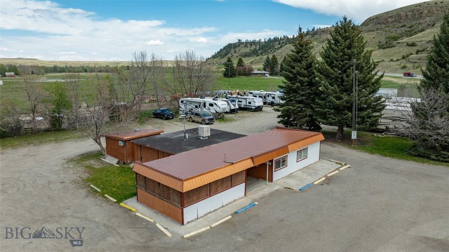 Dew Drop RV Park for sale! Heading South, toward Red Lodge on Highway 78, you enter the quaint mountain town of Absarokee, MT and the Dew Drop is your very first stop.  Enjoy the opportunity to expand this property. Currently, there are 10 full hookup RV sites in operation. One could likely add another 10 RV sites or replace the old cafe with a shiny new gas station. City water and sewer.  Monthly rental on RV sites go for roughly $850 - $1200 in the area. Sky is truly the limit with Absarokee and the Beartooth Mountains set as your backdrop.