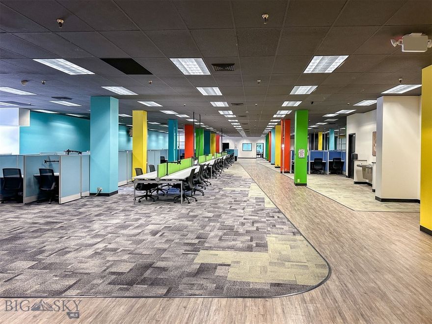 If you are looking for high visibility, and traffic counts in the downtown Great Falls core, this is IT! The modern AND historic building has 5,041 sqft of floor space. Previously, the versatile space was leased to a call center, but would be ideal for retail, bar/restaurant/brewery, law firm, medical services, government, general offices, and so much more. Currently, there is a lobby, reception, seating areas, conference rooms, a full kitchen, dining space, bathrooms, and loading dock. Also, enjoy an extensive fiber optic system and uninterrupted power with a back-up generator. Previous tenant made over a million dollars in tenant improvements. Landlord can rebuild to suit and/or divide the space, if you do not need the full 5,041'. Covered and open parking available, but not included in lease price. Air cooling system in place. Dozens of office chairs, cubicles, televisions, kitchen equipment, other furnishings, shelving, monitor holders are available, but not included in the lease. Carpet and laminate are current floor coverings. Women's bathroom is handicapped accessible and has 10 stalls and 6 sinks. Men's is handicap accessible with 2 stalls, 3 urinals, and 3 sinks. Opening up the mezzanine would create 19 foot ceiling heights. Building formerly dubbed the historic Strain building and was once Sears. Building currently home to an event center, the bar Elevation, golf simulators, counselors, attorneys, and more. Property manager on site. Loading docks are currently shared, but landlord could convert to separate and private, if new tenant needs. Building is NOT FOR SALE. This is commercial lease only. Also, see additional space, for lease, on separate floors, under separate listing.