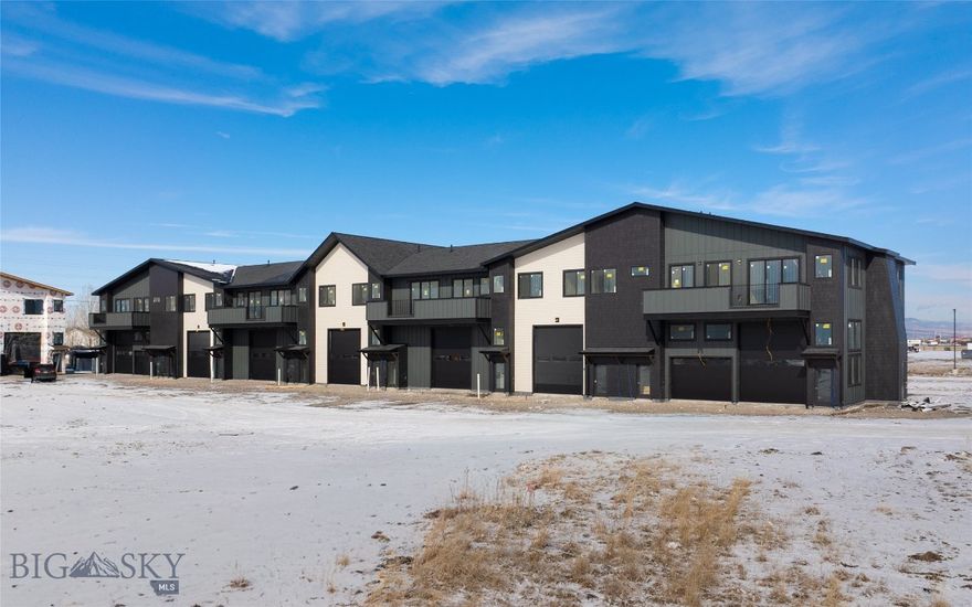 The Cottonwood Flex Plan at Fremont Square is designed for owners who want additional workspace without sacrificing flexibility upstairs. Offering approximately 2,671 square feet, the main level includes 1,286± SF of commercial space with 15-foot ceilings, a 12' x 14' overhead door - Pull through garage, and an ADA-compliant bathroom. The upper level provides 1,385± SF of flexible space that can function as an office suite, studio, or apartment with two bedrooms plus a open flex room that can serve as an office or separate living room. This plan features a large, south facing, 230 sq ft deck that spans the main bedroom and flex room. Located along Jackrabbit Lane near the new Jackrabbit Crossing development, Fremont Square delivers excellent visibility and access to I-90, Bozeman, Belgrade, and Big Sky. A perfect setup for trades, small businesses, hobbyist, owner operated businesses, or light industrial users seeking ownership with built-in versatility.