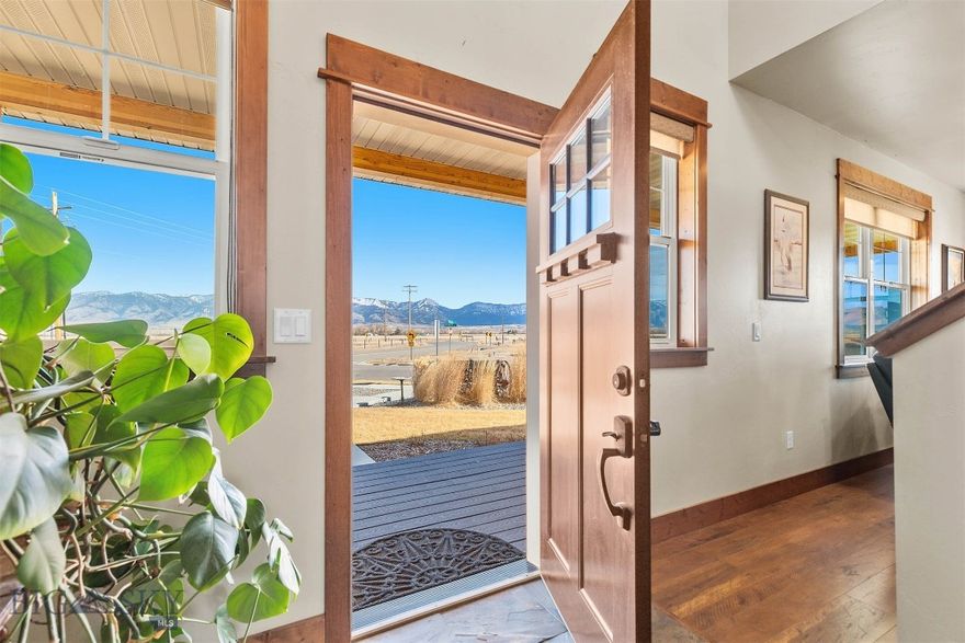 Wait until you see this exceptional Montana home situated on over half an acre in one of Belgrade’s most sought-after subdivisions, Ryen Glenn. Where wide open farmland and breathtaking Bridger Mountain views create the feeling of peaceful country living while remaining incredibly convenient to town.

This beautifully crafted residence offers over 3,600 square feet of thoughtfully designed living space with 4 bedrooms and 3 bathrooms, plus an office. Combining comfort, quality, and timeless style. Attention to detail is evident throughout with stunning wood trim, fine craftsmanship, and warm finishes that create an inviting and refined atmosphere.

The spacious and functional layout features a beautifully appointed kitchen, generous living areas, and a cozy real wood fireplace that serves as the perfect centerpiece for gathering with family and friends. The main floor is equipped with radiant floor heat, providing consistent warmth and comfort during Montana’s colder months.

Enjoy the outdoors from the expansive covered front porch that wraps around two sides of the home, an ideal space for relaxing and taking in the sweeping Bridger Mountain Range views, surrounding farmland, and Montana sunrises.

Car enthusiasts and hobbyists will appreciate the massive 3-car garage totaling over 1,000 square feet, (25x41), complete with radiant floor heat, floor drains and offering abundant space for vehicles, toys, and projects.

Perfectly located less than 5 minutes from Bozeman Yellowstone International Airport and under 15 minutes to Costco, Target, and all the amenities of Bozeman, this property offers the rare combination of privacy, space, luxury, and convenience.

Experience the best of Montana living with room to breathe, spectacular views, and exceptional quality throughout.