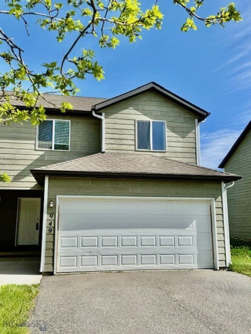 Views of the Bridger Mountain Range welcome you to 949 N River Rock Drive, a 3-bedroom, 2.5-bath end-unit condo nestled in the heart of Belgrade’s desirable River Rock and Royal Village community. Built in 2004, this 1,448 sq ft home offers a perfect blend of comfort, convenience, and of course stunning Bridger Mountain views. Step inside to find a bright, open-concept main level featuring updated flooring, crisp white cabinetry, and a stylish backsplash in the kitchen. The layout flows seamlessly from the living area to the dining space, leading out to a small private fenced backyard—ideal for relaxing or entertaining while soaking in the mountain scenery. Upstairs, you'll discover three spacious bedrooms, including a primary suite with its own full bathroom, plus a convenient laundry area and an additional full bath. Ample storage is available throughout, including generous closets and an attached two-car garage. Located within a well-established HOA community, this condo offers low-maintenance living with access to nearby parks & trails. Whether you're seeking a primary residence or a smart investment property, this home delivers both value and lifestyle in one of Gallatin Valley’s most established neighborhoods. Professionally cleaned and ready to go! Don’t miss your chance to own this move-in-ready gem with million-dollar views. Schedule your private showing today! I think you'll really like this home!