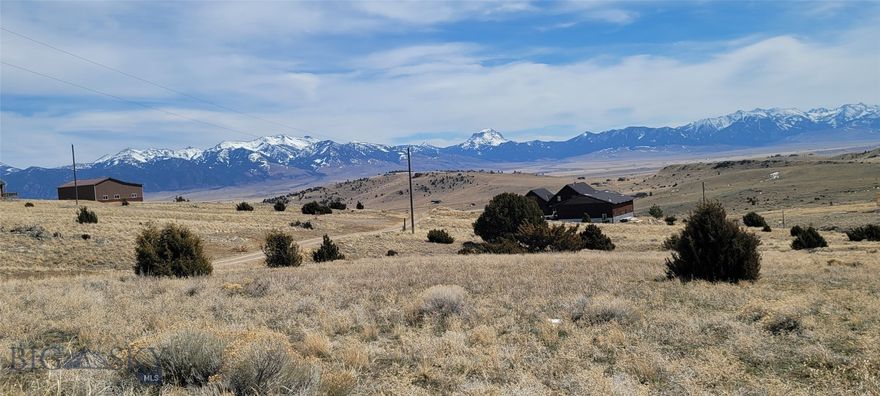 Great views of the Madison Range from this 5.419+ acre parcel in Shining Mountains I. Great spot for a home or cabin. Lots of recreational opportunities. Close to Axolotl Lakes and ownership give you access to Haypress Lakes. Only minutes from the Madison River and public land in the Gravelly Range. There is a one time impact fee to the HOA of $2,500 to build. Approximately 20 minutes to Ennis.