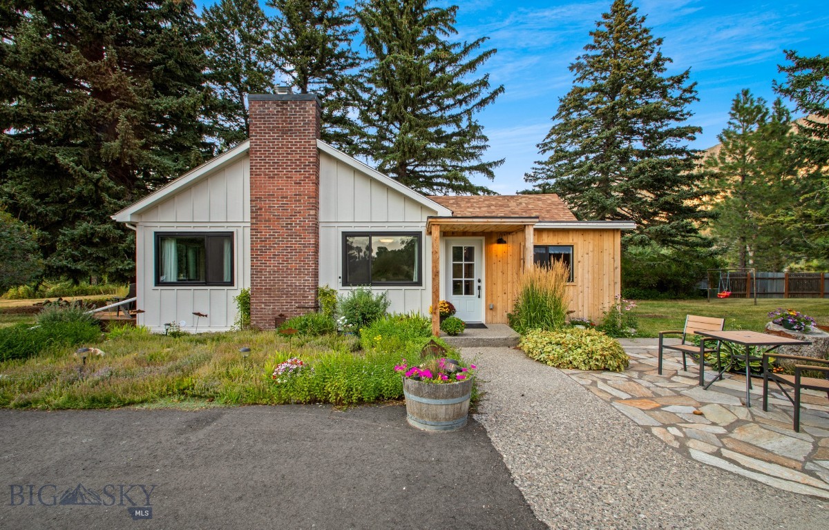 Nestled along the banks of the Yellowstone River in Livingston, this single-level home has been thoughtfully and thoroughly renovated, offering a rare blend of modern comfort and Montana charm. Every detail—inside and out—has been refreshed, right down to the riverbed itself. Set on just over an acre, the property is framed by mature trees and lush landscaping, creating both privacy and a serene natural setting. The main home features 2 bedrooms and 2 bathrooms, designed with clean, timeless finishes and an effortless flow. In addition to the residence, you’ll find a detached garage/shop, ideal for storage or projects, and a brand-new separate studio currently outfitted as a fitness room—flexible for a home office, guest space, or creative pursuits. This is a rare opportunity to own a turnkey riverfront property where every element has been reimagined for both style and functionality, all while embracing the beauty of its unparalleled river setting with views into the picturesque Paradise Valley.