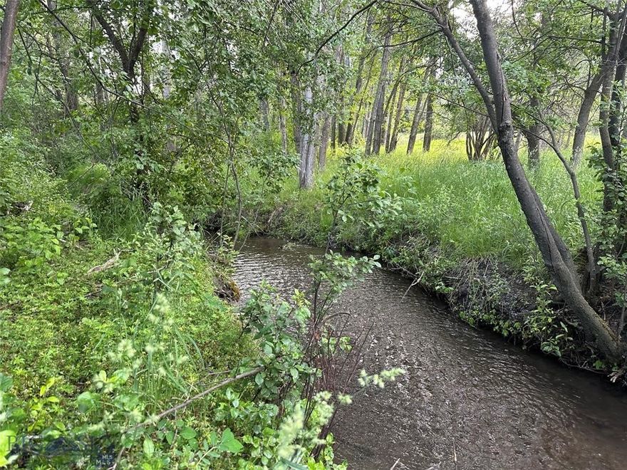 Welcome to one of Bozeman’s most unique and picturesque vacant properties! Sitting at approximately 1.396 acres of natural Montana beauty, located within city limits, it will have you dreaming of the endless possibilities. This breathtaking property offers the perfect blend of privacy, natural beauty, varying topography and a prime location. This private, park-like parcel features a serene creek meandering through the backyard, surrounded by mature aspens and various other established trees that provide both beauty and privacy year-round. In addition to its tranquil setting, the property regularly welcomes local wildlife including black bears, abundant numbers of whitetail deer, various species of fowl and even the occasional wild turkey. Let’s not ignore the private tennis court (shared with adjacent property) that is currently on the property - options to remove or resurface, etc. This property is a rare blend of in-town convenience and a true connection to nature. With plenty of space to build your dream home, this lot is a rare find in Bozeman. Peaceful, scenic, such a variety and full of potential ~ take this opportunity to make it yours. Pictures do not do it justice ~ you need to see it with your agent to really feel the gravity of how amazing it is. Also listed as an option with adjoining 2.472 AC and house (MLS # 409414).  Please make note that this property is agent-owned.