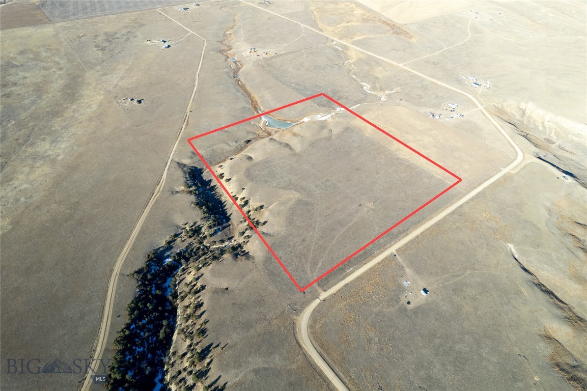 This Property is 40 acres of mostly flat terrain with Natural grasses growing on it and a Natural Spring flowing from it. It comes equipped with a Private Well , Electricity and Fiber optics to Lot, along with Panoramic views of surrounding Mountain Ranges including the Beartooth Mountains, Crazy Mountains and the Little Snowy Range.
This Property has been recently Surveyed and it borders a square mile of State Land on its Southern border. It is only minutes away from Deadman's Reservoir well known for its Sport Fishing and Boating opportunities! Come take a look at this one and don't let it pass you by!