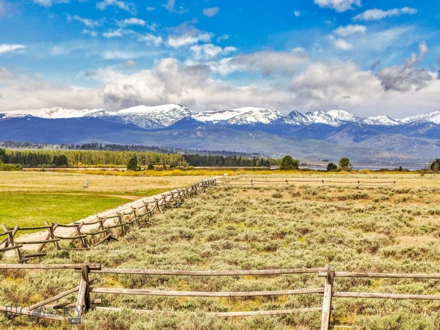 Build your dream retreat in Grayling Arm Meadows—where privacy, panoramic views, and thoughtful community standards create the perfect backdrop for your Montana life. This 5-acre lot offers commanding mountain and valley views, just a half-mile from Hebgen Lake and minutes from legendary trout streams. Covenants protect the peace: no short-term rentals, generous minimum home sizes not less than (2,500) square feet of living space for 2story homes and not less than (1,800) square feet of living space for a single level home, and guest houses allowed. Build garage space for RVs and multiple vehicles without cluttered streets. Enjoy seasonal June, July, and August horse privileges and a neighborhood where every property is built to match the surrounding natural beauty. Engineering site plan and septic in place—bring your builder and vision.