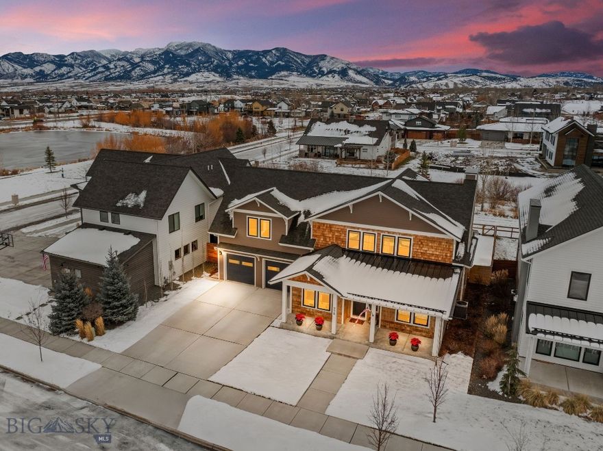 Welcome to this beautifully crafted home in Bozeman’s sought-after Flanders Mill community, offering thoughtful design, modern comfort, and stunning Bridger Mountain views. Warm finishes, generous natural light, and a highly functional layout make this home ideal for both everyday living and entertaining. The main level features an open kitchen–living–dining area centered around a cozy gas fireplace and large windows. The chef's kitchen includes a spacious island and an oversized butler’s pantry, with easy access to the patio and mudroom. Off the entry are two versatile rooms, a guest bedroom and an office with added under-stairs storage. A recently refreshed full bathroom and a heated three-car tandem garage complete the first floor. Upstairs, a large bonus room offers flexible living space, and the commanding primary suite enjoys a private balcony with incredible mountain views, along with his-and-hers closets and a well-appointed en-suite bath. Two additional bedrooms, a full double-vanity bathroom, and a laundry room with a sink round out the upper level. Additional features include a water softener and purification system, updated HVAC, newly improved front landscaping, and thoughtful designer touches throughout. With nearby parks, trails, and convenient access to schools and west-side amenities, this home combines elevated craftsmanship and everyday functionality in one of Bozeman’s most desirable neighborhoods.