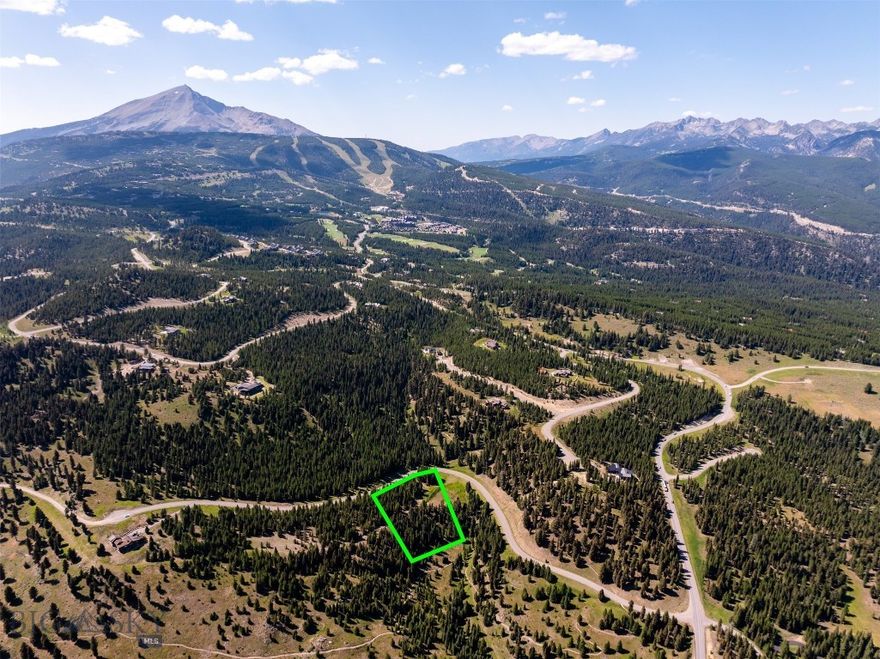 Spectacular panoramic vistas and serene natural surroundings with Eastern views, this homesite offers the perfect balance of privacy and accessibility, providing a peaceful retreat with all the perks of premier club living just minutes away. Watch the sunrise and the moon rise and beautiful sunsets.  Discover the possibilities on Ranch Lot 103—2.55 acres of open, buildable land nestled in one of Big Sky’s most sought-after private communities, Spanish Peaks Mountain Club. 
Lot 103 is ideally situated less than five minutes from the Spanish Peaks Clubhouse, giving you quick access to a full suite of luxury amenities. Enjoy the convenience of storing your gear at the Clubhouse in winter, and take full advantage of summer amenities with hiking, biking, and golf just steps away. As a member, you’ll also receive preferred access and discounts at Montage Big Sky.  And with Big Sky’s Town Center just down the road, you’re close to year-round dining, shopping, and events—including free summer concerts under the stars. A Social membership is available. Spanish Peaks Mountain Club membership application and approval required, deposit due by closing.
