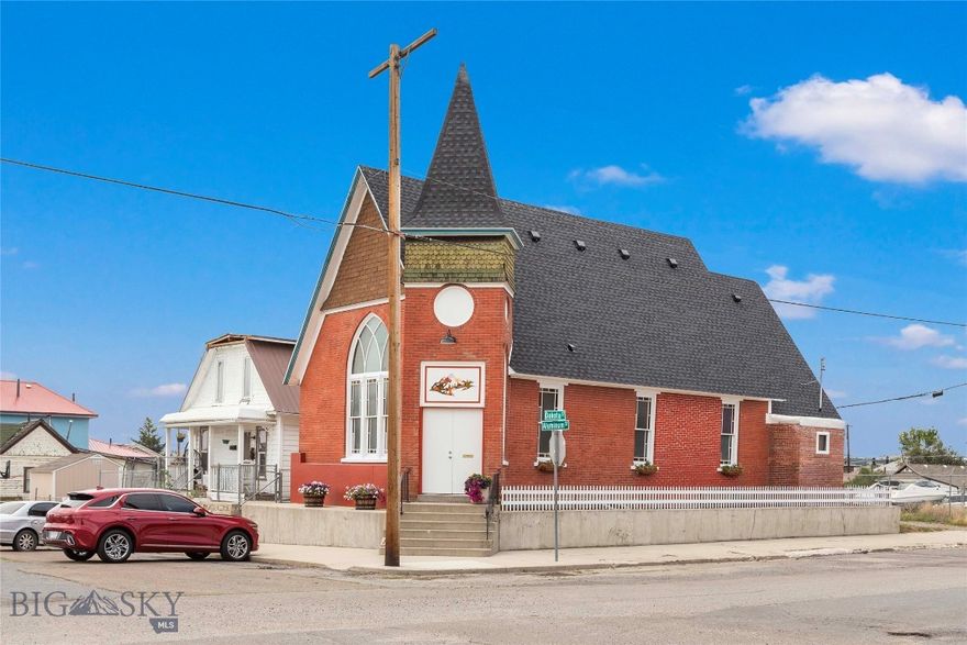 Welcome to this extraordinary opportunity to own a one-of-a-kind property in the heart of Butte. Formerly a church, this structure has been completely transformed into a beautifully designed, modern home that masterfully blends character with comfort.  The building has been fully gutted and reimagined, boasting brand-new plumbing, electrical, HVAC (including central heating and air conditioning), hot water heater, and roofing. The entire home is wrapped in energy-efficient RetroFoam insulation, ensuring year-round comfort.  Inside, you'll find a stylish, open-concept layout featuring luxury tile, granite countertops, high-end fixtures, and premium Samsung appliances. The kitchen and bathrooms are true standouts—designed with tasteful finishes that offer a classy, yet welcoming feel.  This property would make a perfect primary residence or vacation rental thanks to its unique charm and central location. For added convenience, the seller is willing to include furniture, decorations, and nearly all contents for an additional price—making it ready to go as a fully furnished short-term rental from day one.  Don’t miss your chance to own this remarkable piece of Butte history—transformed into a modern-day masterpiece.