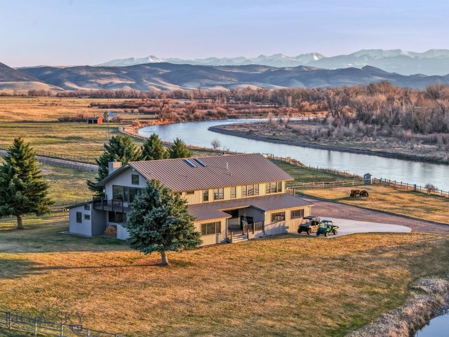 Opportunities like this are exceptionally rare—a stunning 368-acre estate with one mile of Jefferson River frontage, offering unmatched privacy,
beauty, and Western lifestyle. Set against the backdrop of three mountain ranges, this is a property where luxury and nature live in harmony. The
thoughtfully designed 4,710 sq. ft. custom home is exquisitely situated on the bank of the river, designed to capture the views and tranquility of the
setting. Inside, you’ll find 4 spacious ensuite bedrooms, 4.5 bathrooms, radiant floor heating, and numerous high-end upgrades throughout. There is
a separate entrance to guest quarters, as well as a 5-car garage which provides ample space for vehicles, toys, or storage. The land is a dream for
ranchers or recreational enthusiasts, with two 60-acre pivots, extensive water rights, three wells, and fully fenced. A picturesque barn, plus a
charming covered carriage bridge with power, add both function and character. This property supports a lifestyle we all dream about! With easy
access, this ranch offers endless possibilities—raise animals, grow your own food, or simply enjoy the abundant wildlife. Fish, float, hunt, or relax
under expansive Montana skies. Sunsets are simply spectacular. You’ll engage in this private setting, but also proximity to Willow Creek Cafe and
Supper Club, Bozeman airport, and all that Southwest Montana has to offer! It's the kind of place where you can hear yourself think, see the stars at
night, and still be close enough to town for a spontaneous dinner or morning coffee run. This property is not just a home - it is a rare and significant
piece of Montana heritage