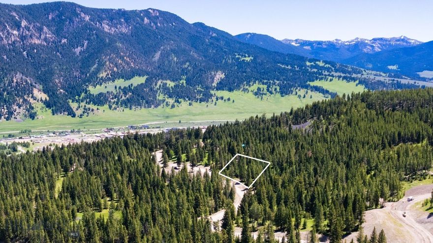 Gallatin Foothills Lot 30 is adjacent to the Terraflow biking and hiking trail and over 26 acres of open space and provides mazing views with mature trees. Its sloping lot is suitable for a walkout basement, offering both privacy and easy access to outdoor recreation.  Introducing the final phase of Gallatin Foothills, where residents will revel in spacious lots ranging from 1 to 2 acres, complemented by over 75 acres of dedicated open space. Each homesite, complete with mature trees and privacy, has been meticulously selected and designed to capture breathtaking sunrise and sunset views, alpenglow, and expansive mountain vistas, all while remaining conveniently close to town amenities. Neighborhood amenities include world-class Terra Flow mountain biking trails, sledding hills, and parks with open spaces perfect for hiking and cross-country skiing. At the base of the development, a trail network provides access to public lands, ideal for snowmobiling, ATV riding, and mountain biking. Fishing enthusiasts will appreciate the incredibly convenient 5-minute access to the Gallatin River. A short drive brings you to Big Sky’s Town Center, Big Sky Resort, and an even shorter trip to Ophir Elementary School, Lone Peak High School, the Warren Miller Performing Arts Center, and countless trailheads and recreational opportunities.