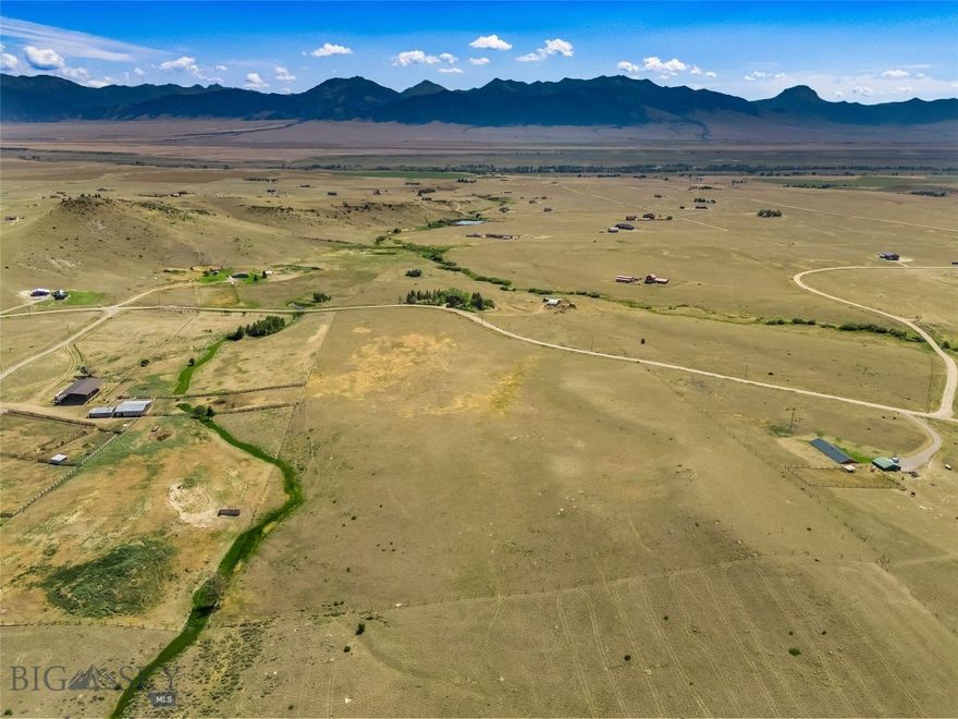 Discover 6.184 acres in the Virginia City Ranches subdivision - an ideal canvas to build your Montana dream home. With sweeping, unobstructed views of the majestic Madison Range, this lot offers the perfect balance of open space, privacy, and convenience. Whether you're looking for a peaceful retreat or a basecamp for adventure, this property delivers. Located just 10 minutes from the charming town of Ennis, you’ll enjoy a welcoming small-town atmosphere, local shops, restaurants, and a tight-knit community known for its western hospitality. Outdoor enthusiasts will love the endless recreation nearby: world-class fly fishing on the Madison River, hunting, horseback riding, hiking, and off-road exploring in the surrounding public lands. In the winter, enjoy cross-country skiing or take a day trip to Big Sky or Bridger Bowl for downhill fun. Bozeman is just an hour away, offering major amenities, shopping, and an airport with nationwide connections. West Yellowstone and the entrance to Yellowstone National Park are also within easy reach, making this a fantastic home base for exploring the Greater Yellowstone region. With ample space to build, no city restrictions, and stunning views in every direction, this is your chance to own a piece of Montana’s wide open beauty.