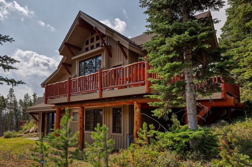 Discover the ultimate mountain retreat in this luxurious Moonlight Mountain Home, perfectly positioned for ski-in, ski-out access to the pristine slopes of Big Sky. Spanning over 2,600 sq.ft., this beautifully upgraded residence combines the warmth of a cozy cabin with modern amenities. Upgrades include new appliances, new furniture, built-in shelving, custom blinds and air conditioning. Located in the exclusive Moonlight Basin community, this home offers unparalleled access to world-class skiing, hiking, and outdoor adventures. With its thoughtful upgrades, spacious layout, and unbeatable location, this Moonlight Mountain Home is a rare gem that promises to be the perfect getaway for those seeking both adventure and relaxation.