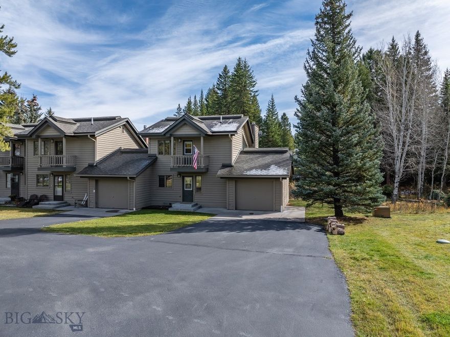 Tucked quietly into the trees on a scenic hillside, Hidden Village offers the perfect blend of privacy and convenience just minutes from all the amenities of Big Sky.   This charming 2-bedroom, 2-bath condominium features an attached single-car garage and a desirable end-unit location. The expanded deck backs to the hillside, providing extra space and a serene, private setting.   The spacious primary suite occupies the loft level, complete with an ensuite bathroom and a private balcony. The second bedroom is on the main level and utilizes an armoire as a closet.  Natural light fills the home through large windows that invite the outdoors in, while a cozy gas fireplace adds warmth and ambiance on cool mountain evenings.   Enjoy being just moments from the vibrant Town Center which is home to shopping, dining, and entertainment, yet surrounded by the tranquility of the forest. Walk to Lone Mountain Ranch’s 80 km of groomed Nordic trails or take a short drive to the world-class skiing at Big Sky Resort.
After a day of adventure, unwind in the community hot tub and sauna, or enjoy a refreshing summer swim in the outdoor pool conveniently located just on the other side of the trees from the condo.  This property is being sold mostly furnished and ready for you to move in and start enjoying the best of Big Sky living.