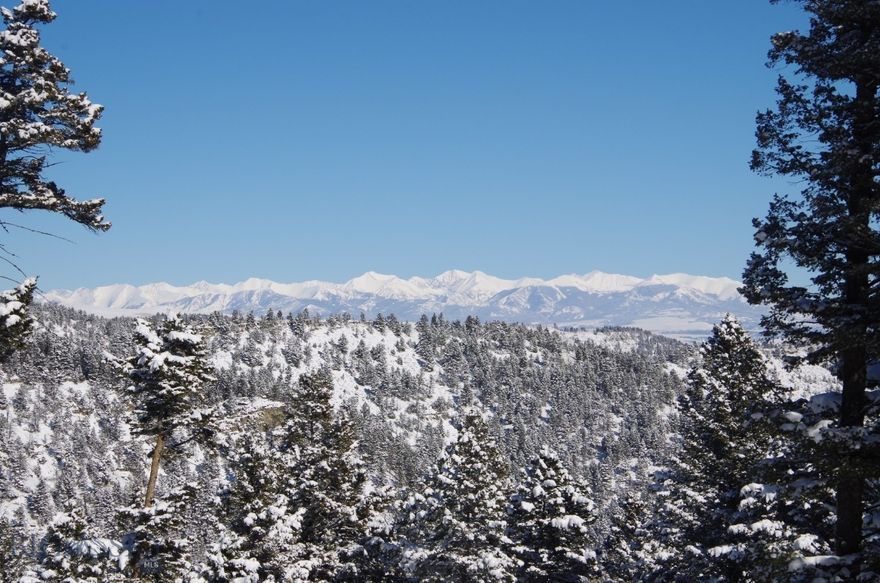 Enjoy the natural beauty of this  mountain getaway in all seasons from the attached photos, then call your Realtor and  take a drive in to this nearly forgotten canyon between Bozeman and Livingston where cattle still roam across the county road, the elk still bugle in the fall, and homes are tucked away in secluded peaceful timbered hideaways. This large secluded acreage features several nice building sites perfect for that getaway cabin or year round living. Cadastral topo map included in documents shows several potential building sites.
 Electricity is at the county maintained road. Tipsue Road has no signage . Look for agent sign.. Property is in the Orea Creek Zoning District