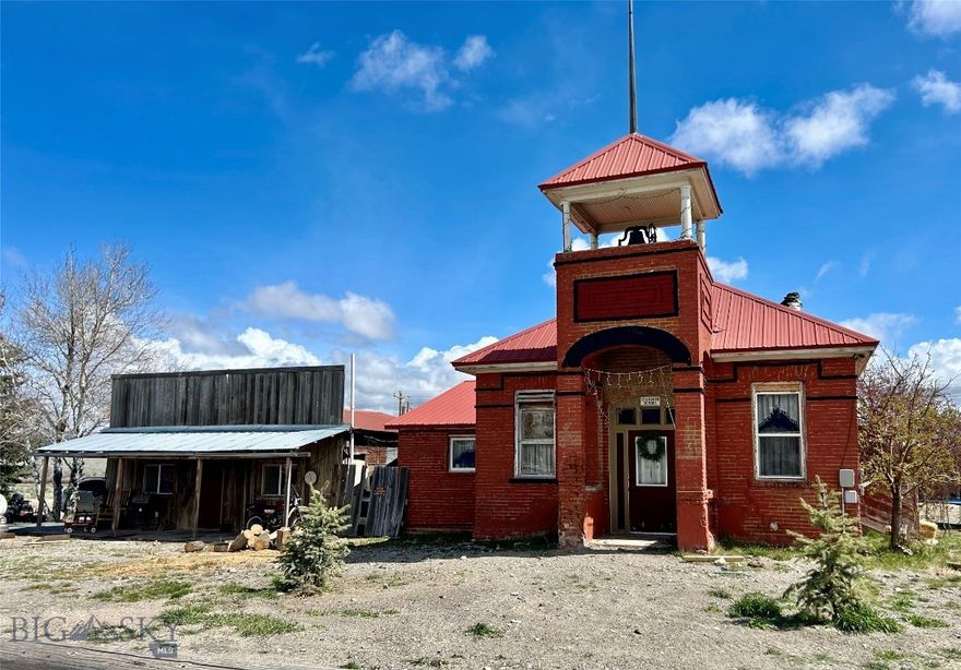 Historic Montana property with land, utilities and endless potential. No Covenants + mountain access=rare opportunity to create your own vision. Set on 1.95 aces and just 30 minutes from Dillon, this historic building is a true piece of local history. Originally built by the community in 1903 as a schoolhouse, it reflects a character that simply can't be replicated today. Located in the heart of prime hunting and fishing country with immediate mountain access, this property is perfectly positioned for outdoor enthusiasts and those seeking a one of a kind Montana retreat. From schoolhouse to cafe, this unique building has served the community for over 120 years. Recently, converted for residential use, the structure offers approximately 1500 sq ft of flexible space ready for your vision. Being sold "AS IS", it will need work-but, for the right buyer, that's where the opportunity lies. The property is already equipped with essentials: private well, two septic tanks and established utilities providing a solid foundation for renovation or continued use. Outside you'll find a livestock lean to and chicken coop along with plenty of space for horses, gear, trailers, RV's, and/or expansion. With no covenants, you have the, freedom to create your ideal set-up whether its a hunting cabin, recreational basecamp, or homestead. Adding to the charm and authenticity, the original historic school house piano, chalkboard, bookshelves and school bell will convey with the property. 

This is not a polished turnkey home, it's something far more unique. Its a place where history, land and freedom come together waiting for the right buyer to bring it to life.