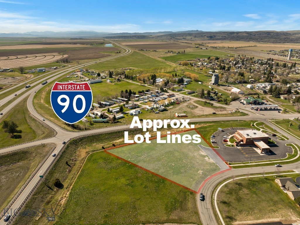 1.6 commercial acres located directly off of I-90, Exit 288! Just 15 minutes from Bozeman, this is one of the few remaining vacant parcels zoned "Neighborhood Highway Business” in Manhattan. High traffic counts and huge visibility. Adjacent to Stockman Bank and Ace Hardware, this is the perfect location for grocery store, fast food, retail, restaurant, medical facility and more. The Farmstead Subdivision is a master planned subdivision featuring commercial businesses and residential multifamily lots at the entrance of the Town of Manhattan, providing corridor access to Taylor park, the Farmstead’s public park, open green spaces, paved walking trails, picnic areas, baseball diamonds and a fenced in dog park all while being close to downtown. Call your favorite commercial agent for all details!