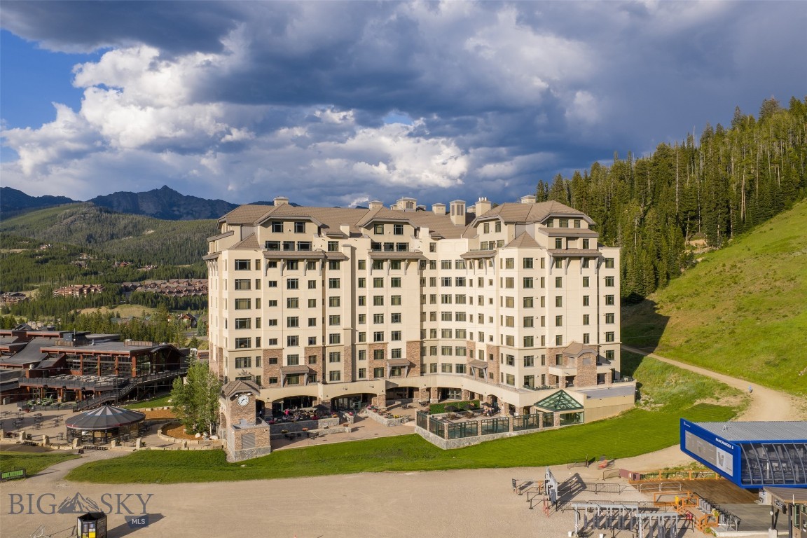 Experience Big Sky's world-class skiing directly from your doorstep in this 3rd floor unit located in the heart of Big Sky's Mountain Village. This recently remodeled 2 bedroom, 3 bathroom corner unit located in the luxury 4-star Summit Hotel offers 1395 sq ft of ski-in/ski-out living space. Views are of the Spanish Peaks, Lone Mountain, and the Exchange Plaza area. Wake up and head straight from the lobby to one of Big Sky's 2 largest chairlifts, Swift Current 6 and Ramcharger 8. When you're done on the mountain for the day, enjoy relaxing in the outdoor heated pool on the lower level. The Summit Hotel amenities include a full service fitness room, room service from the on-site restaurant, concierge services to book activities and dining, and underground valet parking. Live like royalty in this premier Summit Hotel ski in/ski out condominium offering unparalleled amenities and location in the heart of Big Sky's Mountain Village.