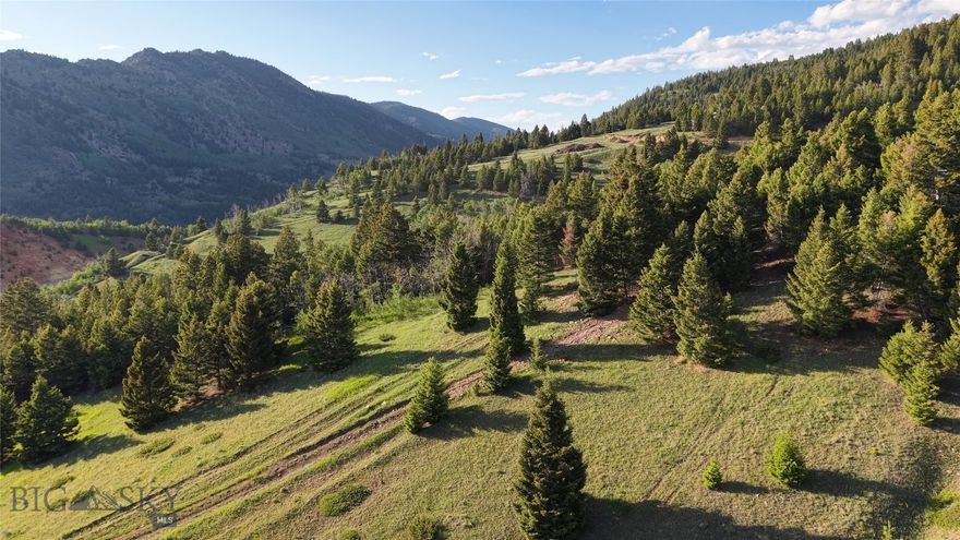 Just outside of Butte, Montana, this 98-acre parcel which is a smaller part of the original Horse Canyon Retreat offering which offers a mix of timber, aspen groves, and open meadows with views of the Highland Mountains and valley. Springs and  Douglas Fir provide excellent wildlife habitat, attracting elk and deer throughout the seasons. A solid internal road system allows easy access to multiple building sites, with power available and septic approval already in place. Free of covenants or restrictions, this tract is ready for a wide range of uses, whether as a mountain retreat, recreational basecamp, or private getaway within minutes of town.