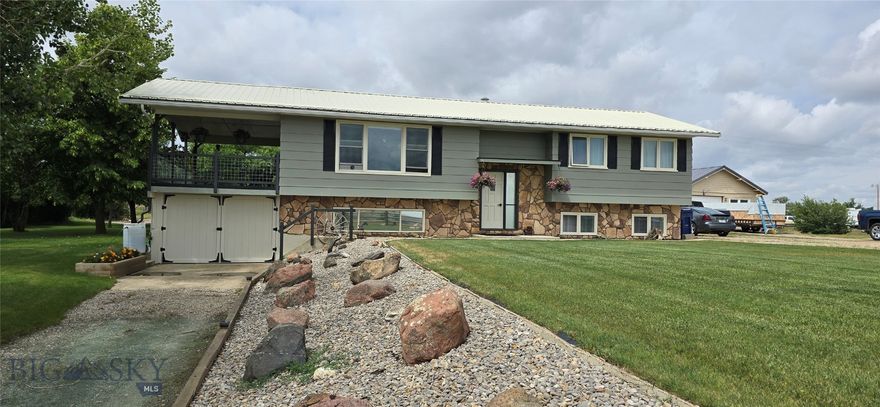 Experience the perfect blend of modern living and rural tranquility with this beautifully remodeled 3-bedroom, 2-bath home, offering 2,382 sq. ft. of living space on three city parcels totaling approximately 2.3 acres.  Nestled in the friendly community of Winifred, this home is ideally located just 40 miles from Lewistown and less than 20 miles from the Upper Missouri River Breaks National Monument. This area provides endless opportunities for outdoor enthusiasts, with world-class hunting, fishing, hiking, and biking all within reach. Winifred also boasts a recently upgraded K-12 school, modern amenities including a hotel, restaurant, coffee shop, grocery store, post office, and a community center.  The town is currently undergoing a civil improvement project with all new curbing, sidewalks, and paved roads being completed throughout.

Spacious and designed for both comfort and entertaining, this split-level home connects to city water but also features its own private well, perfect for irrigation and gardening. The property includes a side parcel and a large backyard, offering ample space for a workshop, RV hookups, or even a guest dwelling.  Recently remodeled, the home features open living, spaced out over two levels with new finishes throughout.  The original homestead buildings have been reconfigured and are now being used as bunkhouse/guest quarters, single car garage and heated shop space w/cold storage at the back.

This property is your gateway to small-town living with unmatched access to Montana’s outdoors!