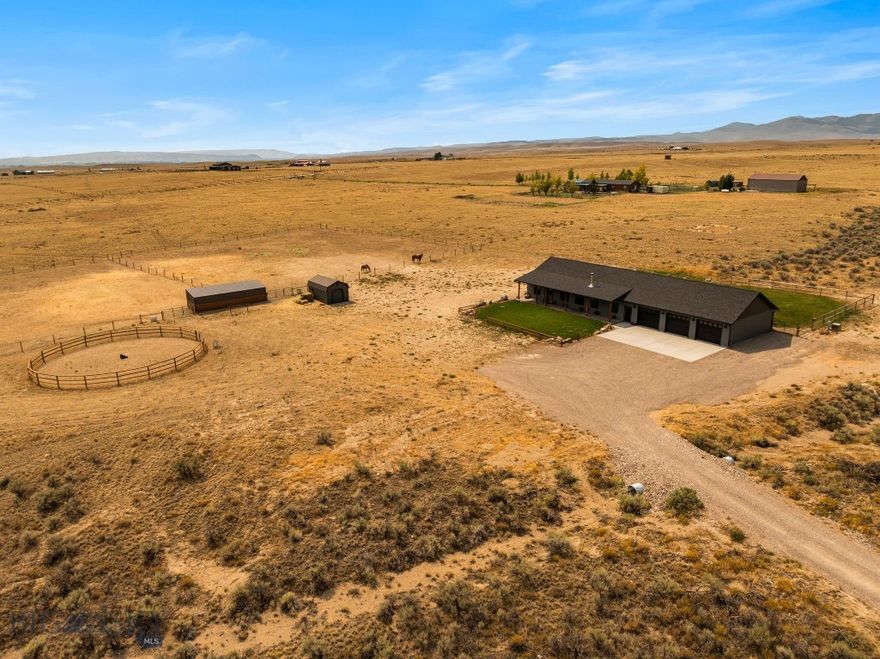 Here’s your chance to own an incredible horse property with over 10 acres of stunning mountain views. This newly built home offers a comfortable 3-bedroom, 2.5-bath layout, blending practicality and style perfectly. Inside, enjoy high vaulted ceilings, a cozy wood stove in the living room, central A/C, and beautiful alder wood kitchen cabinets. The spacious primary suite includes a luxurious soaking tub for ultimate relaxation.

Step outside to the covered front and back porches—perfect for soaking in the mountain scenery. Plus, the oversized, heated 3-car garage offers extra space for your vehicles and gear.

For horse lovers, this property is fully equipped with everything you need. Two separate pastures, each enclosed with smooth wire fencing, provide plenty of room for your animals. There’s a 60-foot wooden round pen for training, a lighted 3-stall run-in shed with a heated water trough, and a well-organized tack shed for all your equestrian gear. Whether you’re riding, training, or caring for your animals, all of it is just a short walk from the house.

Located just minutes from the Big Hole, Beaverhead, and Jefferson Rivers, this property offers the best of both worlds: peaceful rural living with easy access to world-class fishing and outdoor adventures. If you're looking for a fully functional horse property with space, views, and all the modern amenities, 9 Sundust Lane is the perfect fit.