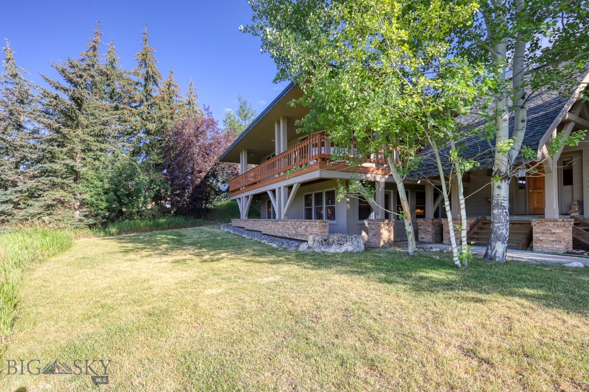 If location is important to you, this is it! This well maintained Timber Frame home, constructed by Big Timber Works/Blue Ribbon Builders, is located in the upscale Sweetgrass Hills neighborhood at the very top of the subdivision. The home location offers panoramic views to the south, overlooking the Big Sky Meadow Village and views of Lone Peak Mountain in the distance. The property backs up to a 20 acre parcel, with the ever popular Reflector Hiking Trail easement on it. Perfect for that daily walk in the woods, right from the house. The home has a Security System, 3 bedrooms, 3.5 bathrooms (all with new fixtures), with upper and lower level great rooms (each with fireplaces), for entertaining the family or guests. A front covered deck and rear private patio, are perfect for that outside time. A new roof was just installed using 50 year Timberline Shingles. The world class Big Sky Ski and Summer Resort is a short drive up the Mountain Road. All of the summer and winter amenities are minutes away. Big Sky offers unlimited activities, restaurants, shopping, Music In The Mountains, Farmers Market and so much more.