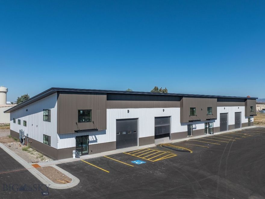 Located within Belgrade’s highly desirable West Post development, this newly constructed 17,600 SF warehouse offers a flexible, high-quality solution for a variety of commercial or light industrial users. Designed with adaptability at its core, the building can be demised into three units, two at approximately 6,500 SF each and one at 4,600 SF, or alternatively into two larger units measuring approximately 6,500 SF and 11,100 SF, allowing for customized occupancy or multi-tenant use.

Each space includes a carpeted mezzanine office area ideal for day-to-day operations, 3-phase power, and a private bathroom for staff convenience. The building features multiple overhead doors, including 14-foot front-facing doors for customer or equipment access and 10-foot rear doors for operational efficiency, along with 50 feet of dedicated yard space suitable for outdoor storage, parking, or maneuvering equipment.

A 10% rental discount is available for a tenant occupying the entire building. With quick access to I-90 and Jackrabbit Lane, this modern warehouse offers an excellent balance of accessibility, adaptability, and high-quality construction in one of Belgrade’s most desirable commercial locations.