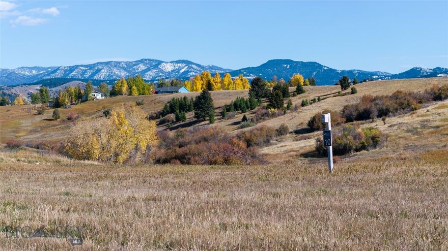 Sandhill is a one-of-a-kind south-side Bozeman community featuring 34 spacious 2–3 acre lots across 160 breathtaking acres. With stunning mountain views, an interconnected trail system, and easy access to downtown Bozeman, Montana State University, and outdoor adventures, this neighborhood offers the perfect balance of serenity and convenience. Lot 10 features direct access to Sandhill trails, open space on multiple sides, and overlooking views of State of Montana land, and Mount Ellis or the Bridger Range in the distance.

These final lots not only offer peaceful backyard views, direct trail access, and unforgettable alpenglow sunsets over the Bridger Mountains but also come with access to Sandhill’s neighborhood Amenity Barn, a thoughtfully designed community hub. Enjoy a multi-sport court for pickleball and basketball, a putting green, a children’s play area, a sledding hill, and multiple fire pits for year-round gatherings. The private barn, with a covered pavilion and entertainment lounge, provides a cozy retreat with sweeping mountain views.
