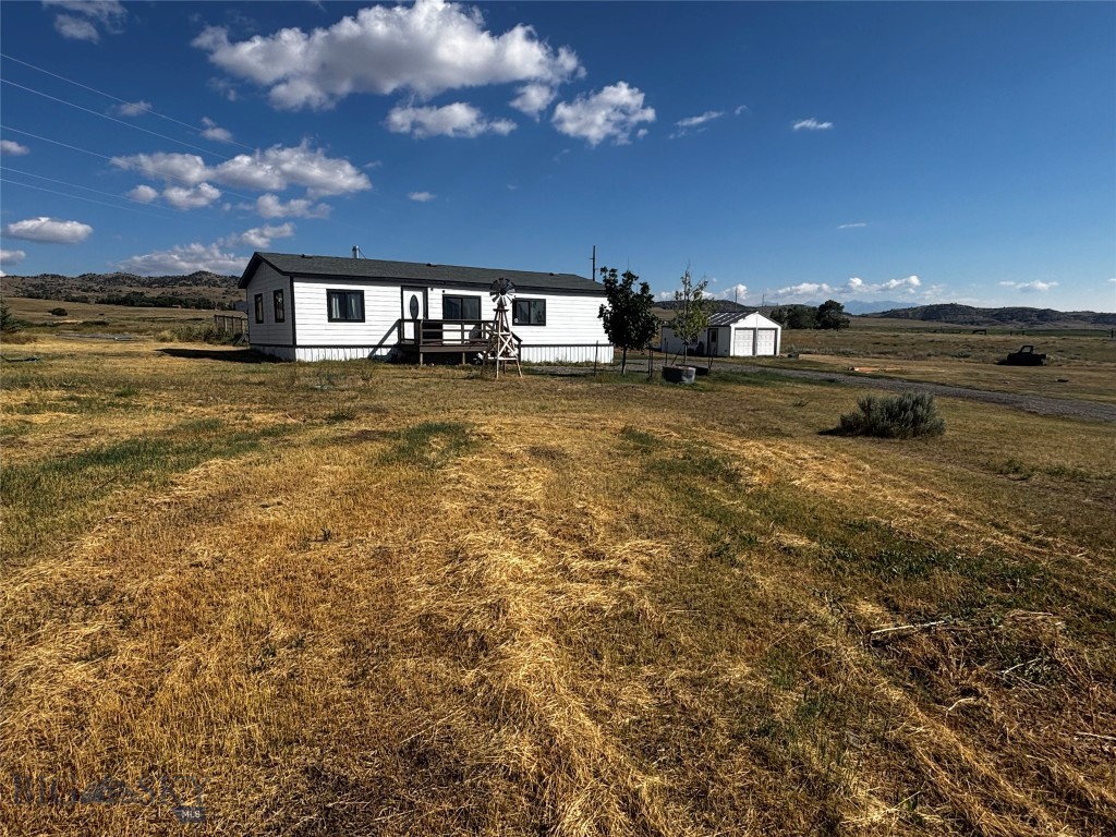Great 2.49 acre property with amazing views, Slaughterhouse Creek on the property line, and just a few minutes north of Livingston, MT! Tucked away behind a quiet subdivision, this acreage includes a 1985, 24x48, 3 bedroom/2 bathroom manufactured home that the owner is in the process of updating and just needs to be finished. It is not on a foundation and the owner may be willing to remove it for the new owners to start fresh. Property also features a 20x24 insulated, heated, 2-car garage. There is a large, fenced garden spot and lots of wide open space for relaxation, toys, pets, etc. No known covenants or restrictions. Private 50-gal/min. well and septic.