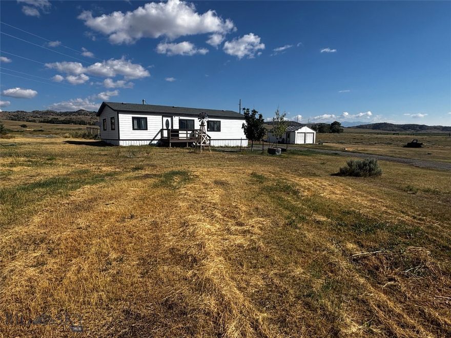 Great 2.49 acre property with amazing views, Slaughterhouse Creek on the property line, and just a few minutes north of Livingston, MT!  Tucked away behind a quiet subdivision, this acreage includes a 1985, 24x48, 3 bedroom/2 bathroom manufactured home that the owner is in the process of updating and just needs to be finished.  It is not on a foundation and the owner may be willing to remove it for the new owners to start fresh.  Property also features a 20x24 insulated, heated, 2-car garage.  There is a large, fenced garden spot and lots of wide open space for relaxation, toys, pets, etc.  No known covenants or restrictions.  Private 50-gal/min. well and septic.
