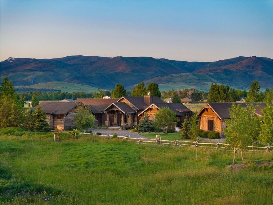 Welcome to your dream Montana estate—20 acres of refined Western living with sweeping 360 degree views of the Gallatin, Spanish Peaks, and Bridger mountain ranges. Located just two minutes from world-class fly fishing on the Gallatin River and surrounded by endless recreation, this custom-built estate is the ideal primary residence, vacation retreat, or equestrian sanctuary. Thoughtfully designed for comfort and ease, the single-level main home spans 2,703 square feet, and blends rustic elegance with modern function. Artisan trusses, handcrafted entry details, and premium finishes throughout reflect the home’s quality craftsmanship at every corner. The main home features elegant circle-sawn white oak flooring, marble and granite countertops, and thoughtful luxury touches throughout, as well as a spacious 800 square foot attached garage. The open-concept layout connects indoor spaces effortlessly, while expansive windows frame breathtaking mountain vistas from nearly every room. Step onto the back patio and enter a true backyard oasis, complete with expansive irrigated lawn, multiple garden areas, a custom fire pit feature, horse shoe pit, and some of the most commanding mountain views in the area. A separate 1,033 square foot guest/bunkhouse offers private accommodations for visiting guests and family members, or can be used to generate impressive rental income. Complete with it's own full kitchen, bathroom, and laundry room, the bunkhouse is ideally positioned for both privacy and access. Perfectly suited for horse lovers, this property features two horse sheds, dry lot corrals, a 200’ x 240’ riding arena, and fully fenced pastures. The front field produces timothy and brome hay annually, and the property includes valuable water rights to the Noble Ditch, which flows along the eastern edge of the property. Additional outdoor amenities include an invisible fence system for dogs, and endless opportunities for riding, hiking, and exploring the surrounding countryside. The property enjoys the added flexibility to be subdivided one time, adding limitless potential. Located just minutes from the Gallatin Gateway School, local dining and music venues, and additional public river access points, this estate combines the privacy of country living with the convenience of a prime location. Whether you're seeking tranquility, adventure, or income potential, this extraordinary Montana property delivers it all.