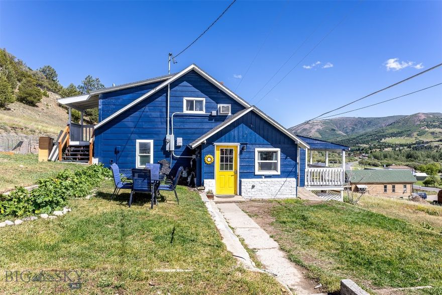 INVESTMENT OPPORTUNITY! Unique property west of Anaconda with spectacular views of Mount Haggin.  The property has 7+ acres with main farmhouse and accessorie dwellings. There are additional storage sheds, small animal barn, pole barn & storage garage. Step into the main house with open kitchen and eating area, living room and three bedrooms and bath complete the main floor. There is a 1300 cistern for good water pressure. Upstairs is a large bedroom with smaller bedroom and bath tucked into the attic space.  A large covered, front porch with swing is a highlight feature which overlooks Mt Haggin. This property sits at the edge of Anaconda's residential area and is a short drive to Georgetown Lake and Discovery Basin Ski Area. You are close to town with the advantage of your own space. Could be used for short term rentals.