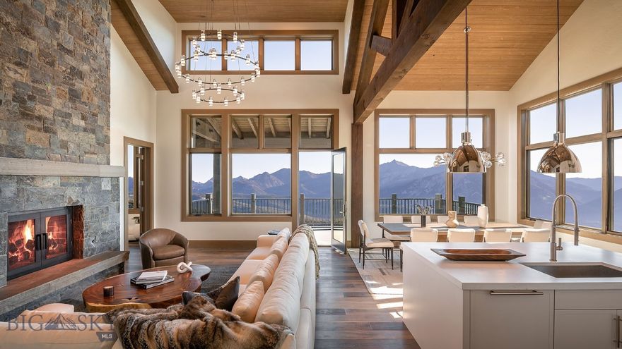 Welcome to Inspiration Point at Spanish Peaks Mountain Club, boasting the best views in Big Sky. Residence 9B embodies the essence of its name, featuring captivating panoramic views that leave a lasting impression. This thoughtfully designed residence is an elegant retreat, offering some of the finest views in Spanish Peaks Mountain Club, framed by stunning Montana mountains. It’s the perfect escape for those seeking comfort and natural beauty. Residence 9B is beautifully finished with a 'neutral' package, enhancing the inviting atmosphere of your living space. This residence is a 5 bed, 6 bath, 4,275+/- sq. ft modern mountain retreat that amplifies natural light and seamlessly blends comfort and nature. Boasting vaulted ceilings and a covered balcony and patio, an open concept kitchen with high-end appliances, walk-in closet off the primary bedroom, wet bar on the lower level, hot tub, and large flex room suited to let your imagination run with possibilities, this residence is one you'll want to visit. Located a short distance from the Clubhouse, you may valet your car and strap on your skis to access the extensive trails at Big Sky Resort in minutes. After a day of adventure, relax at the inviting Clubhouse for après and dinner, or pamper yourself with a spa day at Montage Big Sky, followed by elevated cuisine at Montage Big Sky's multiple dining venues. In the summer, enjoy mountain biking, hiking, and golfing on two world-class Weiskopf-designed courses: Tom's 10 Par 3 and the Championship Golf Course. Discover the perfect balance of comfort and adventure at Inspiration Point, where every day invites new experiences and stunning vistas in the heart of Big Sky, Montana. Photos shown depict a similar residence.