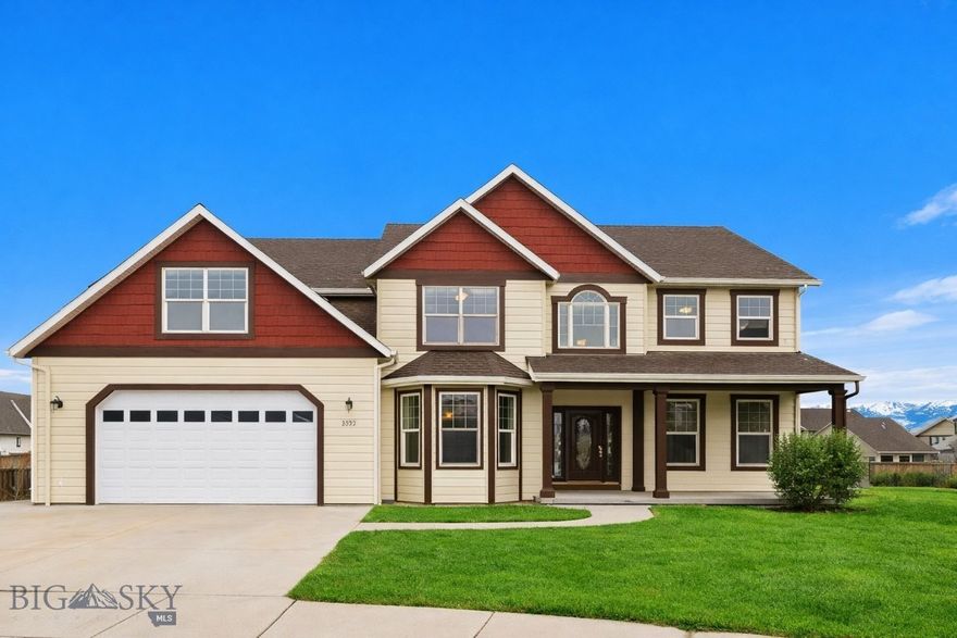 From the moment you step inside, this exceptional residence makes a statement. A stunning curved oak staircase anchors the entry and sets the tone for the craftsmanship and thoughtful design found throughout the home. Offering four bedrooms, three bathrooms, and over 3,000 square feet of living space, the layout strikes a perfect balance between elegance and everyday comfort. On the main level, you will find a bedroom, full bath, laundry room, formal dining area, office/den space, kitchen, and living area. Expansive living room windows are intentionally positioned to frame sweeping views of the Bridger and Spanish Creek mountain ranges. The kitchen is designed for both function and entertaining, featuring state of the art Bosch appliances and generous space for cooking and hosting. The living area is centered around a custom wood burning fireplace, creating a cozy and welcoming space.

Stairs guide you up to a versatile loft space, perfect for a home office, playroom, or reading nook. The primary suite is a serene retreat, featuring a sitting area, dual walk-in closets, and a spa-inspired bath with dual vanities, a walk-in glass shower with dual showerheads, and a jetted tub. A laundry chute adds a practical and efficient touch. Another generously sized bedroom includes an en suite bathroom with double vanities, thoughtfully placed for privacy and convenience. The open railed catwalk adds architectural interest and connects to a private guest bedroom, ideal for visitors. Abundant natural light fills each room, enhancing the home’s open and inviting atmosphere. Timeless wood flooring runs throughout, adding warmth, durability, and effortless style. Tucked away on a cul-de-sac, this home has been lovingly maintained by its original owners. The location is equally impressive, with walkable access to Emily Dickinson Elementary School, the Bozeman city trail system, Gallatin Regional Park, and a wide array of shopping and dining options. This is a rare opportunity to own a home that seamlessly combines thoughtful design, exceptional upkeep, breathtaking mountain views, and an unbeatable Bozeman lifestyle. Additional highlights include humidity control, dimmer switches throughout, and a beautifully landscaped backyard complete with an underground sprinkler system and raised garden bed, perfect for enjoying Montana’s growing season.