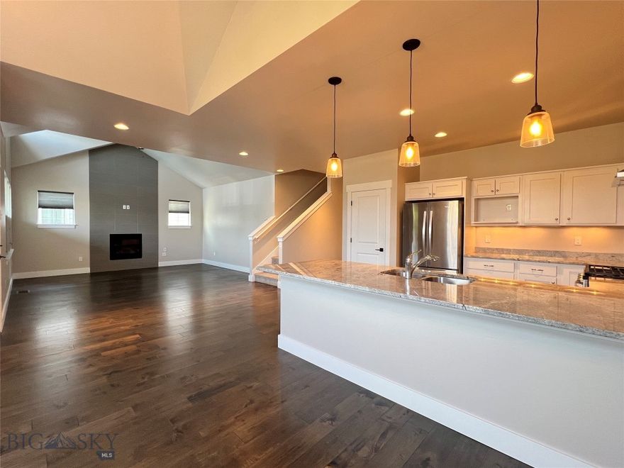 This charming cottage-style home offers the best single-family value south of Montana State University, nestled in one of Bozeman’s great south-side neighborhoods. Thoughtfully designed for comfort and convenience, it features a spacious main-floor master suite, a vaulted living room warmed by a gas fireplace, and an inviting kitchen with plenty of room to gather. Upstairs, two generously sized bedrooms share a full bath, providing flexibility for family, guests, or a quiet home office. The fully fenced and landscaped yard. Attached two-car garage handles Montana winters with ease. Fresh paint and brand-new carpet throughout mean it’s truly move-in ready. Located just minutes from MSU, downtown Bozeman, this home combines an unbeatable location with turnkey appeal. Contact your agent to see soon!