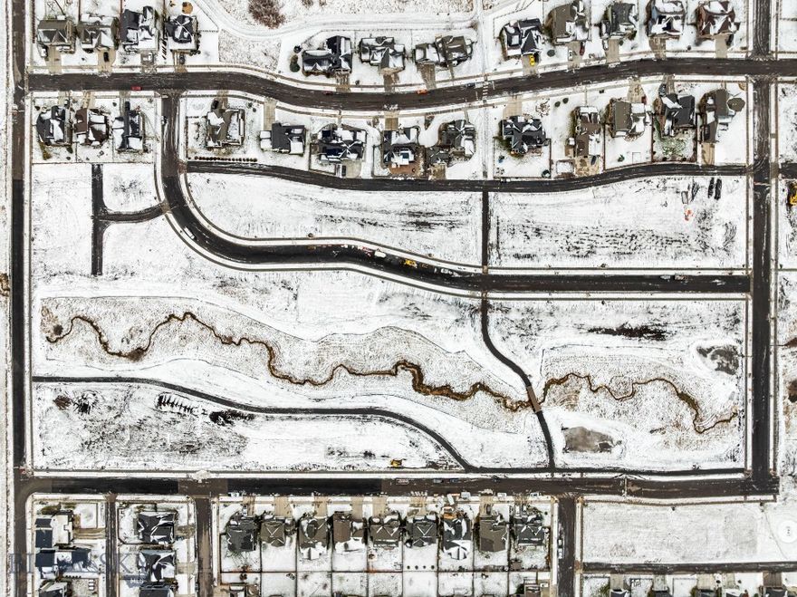 Welcome to Meadow Bridge, Bozeman’s newest premier neighborhood located on the highly desirable south side of Bozeman. This thoughtfully planned subdivision features 45 fully entitled homesites ranging from approximately 4,000 to 14,000 square feet—offering the perfect setting to bring your custom dream home to life.

Meadow Bridge is also one of the last remaining subdivisions within the city limits dedicated exclusively to single-family homes, making it a rare opportunity for those seeking a traditional neighborhood setting without multi-family development.

Residents will enjoy beautiful views of the Bridger Mountains, a well-designed neighborhood setting, and convenient access to nearby parks, open space, and walking trails. The community is ideally located just minutes from historic downtown Bozeman, with easy access to dining, shopping, recreation, top-rated schools, and Montana State University.

This particular homesite is one of the cozier lots in the subdivision and offers convenient access to nearby open space and a community trail, making it easy to step outside and enjoy the outdoors. The lot still provides plenty of opportunity to design a thoughtfully planned home that suits your lifestyle—whether you envision a modern farmhouse, a charming cottage, or a well-designed two-story home.

Bring your builder and start planning your future in Meadow Bridge—where the comfort of a close-knit neighborhood meets the convenience and beauty of living in Bozeman.