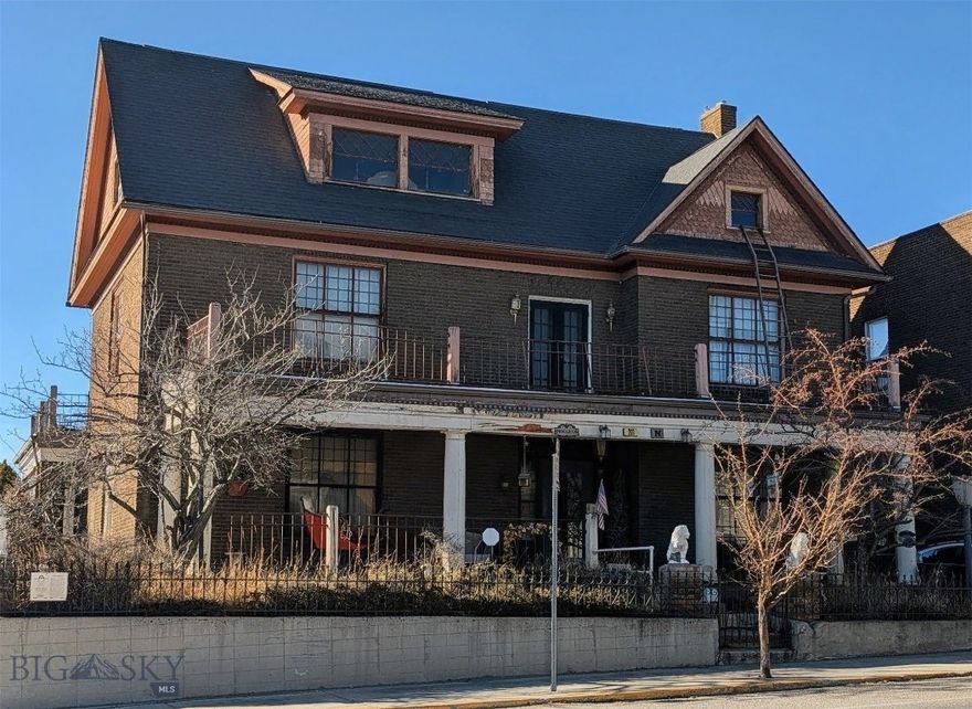 Located in the heart of historic Uptown Butte, this remarkable 1916 Victorian-style brick home is a beautiful piece of the city’s mining-era history. Built during Butte’s copper boom, homes like this were designed to showcase craftsmanship and permanence—and many of those original details remain today.

The stately brick exterior, classic gables, and welcoming front porch reflect the grand architecture that defined Uptown Butte in the early 1900s. Inside, detailed woodwork, tall windows, and spacious rooms highlight the craftsmanship of the era and capture the character of a time when Butte was booming and proudly known—then and now—as “The Richest Hill on Earth.”

Adding to the property’s versatility is a detached garage with a one-bedroom apartment above, offering potential for guests, rental income, or additional living space.

This home does have deferred maintenance and is being sold as-is, making it a great opportunity for someone ready to restore and enhance a historic property. The home is priced below value to reflect the work needed, with the 2025 tax assessed value reported at $802,071, presenting a rare opportunity to own a historic Uptown property with significant potential.

There may also be grant funding available to help support upgrades or improvements, which could assist in preserving this piece of Butte’s architectural heritage.

Located just minutes from Uptown shops, dining, and historic landmarks, the property places you right in the heart of one of Montana’s most unique historic districts.

Showings will begin March 18, 2026.

Call your favorite real estate agent to schedule your showing today!
