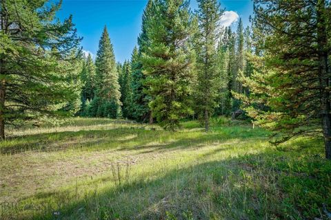 Photo of NHN Skywood Road, Big Sky, MT 59716 (MLS # 405677)
